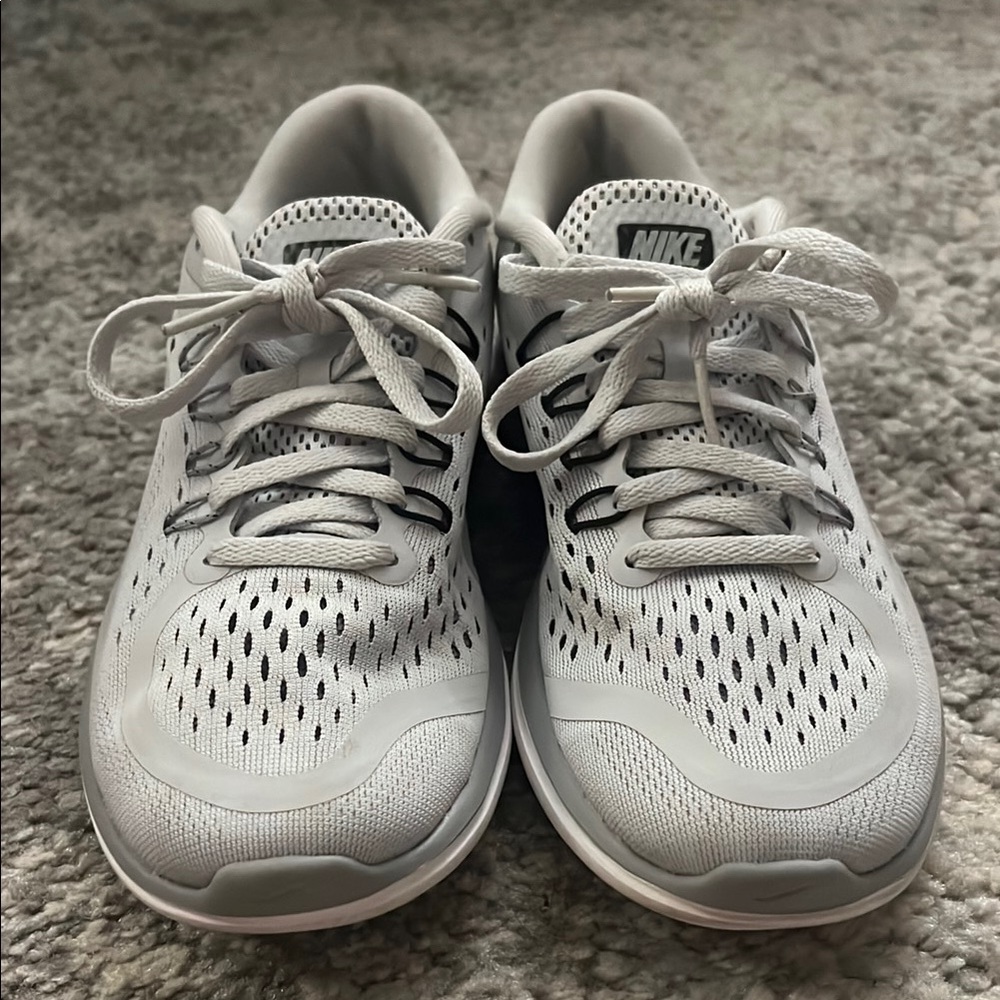 Nike Women’s Grey and White Flex Run Shoes